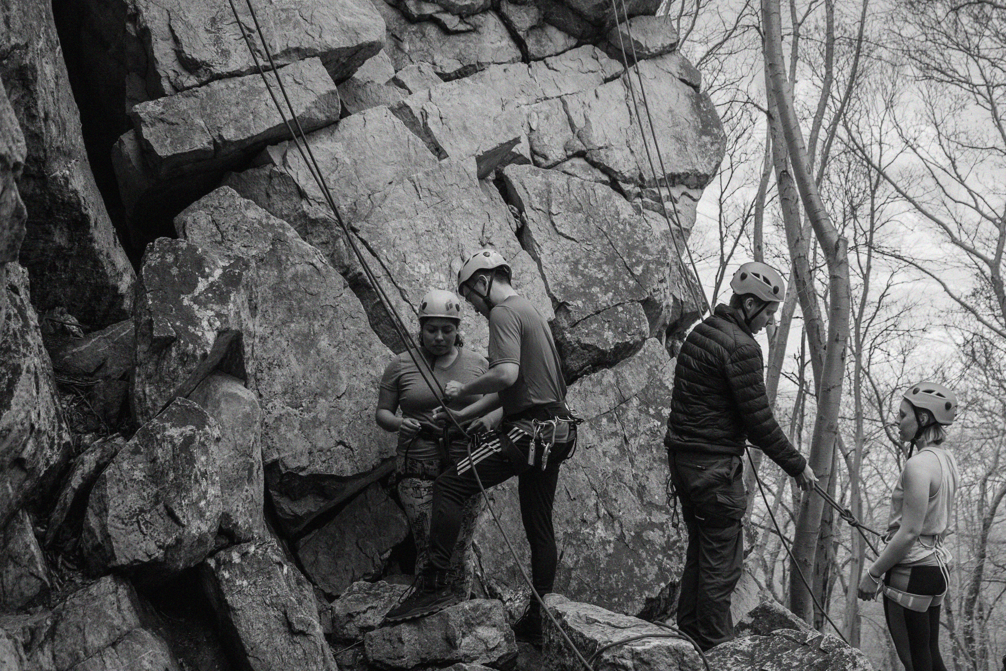Image of people rock climbing