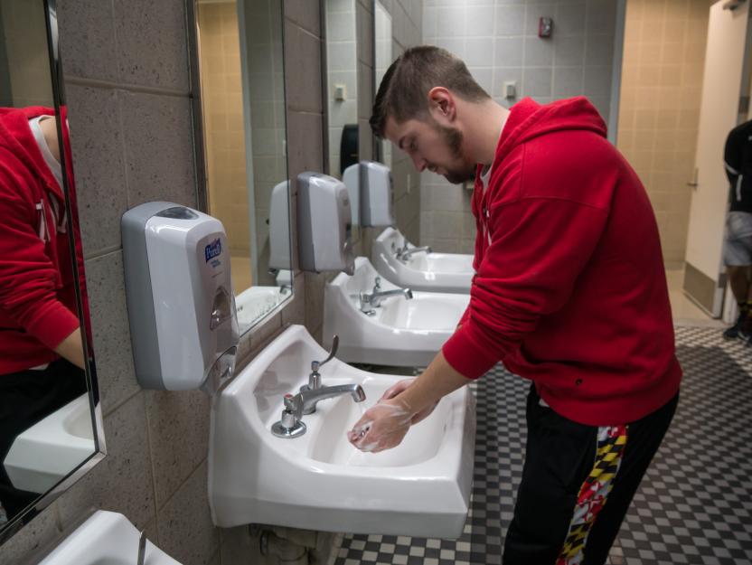 man washing hands