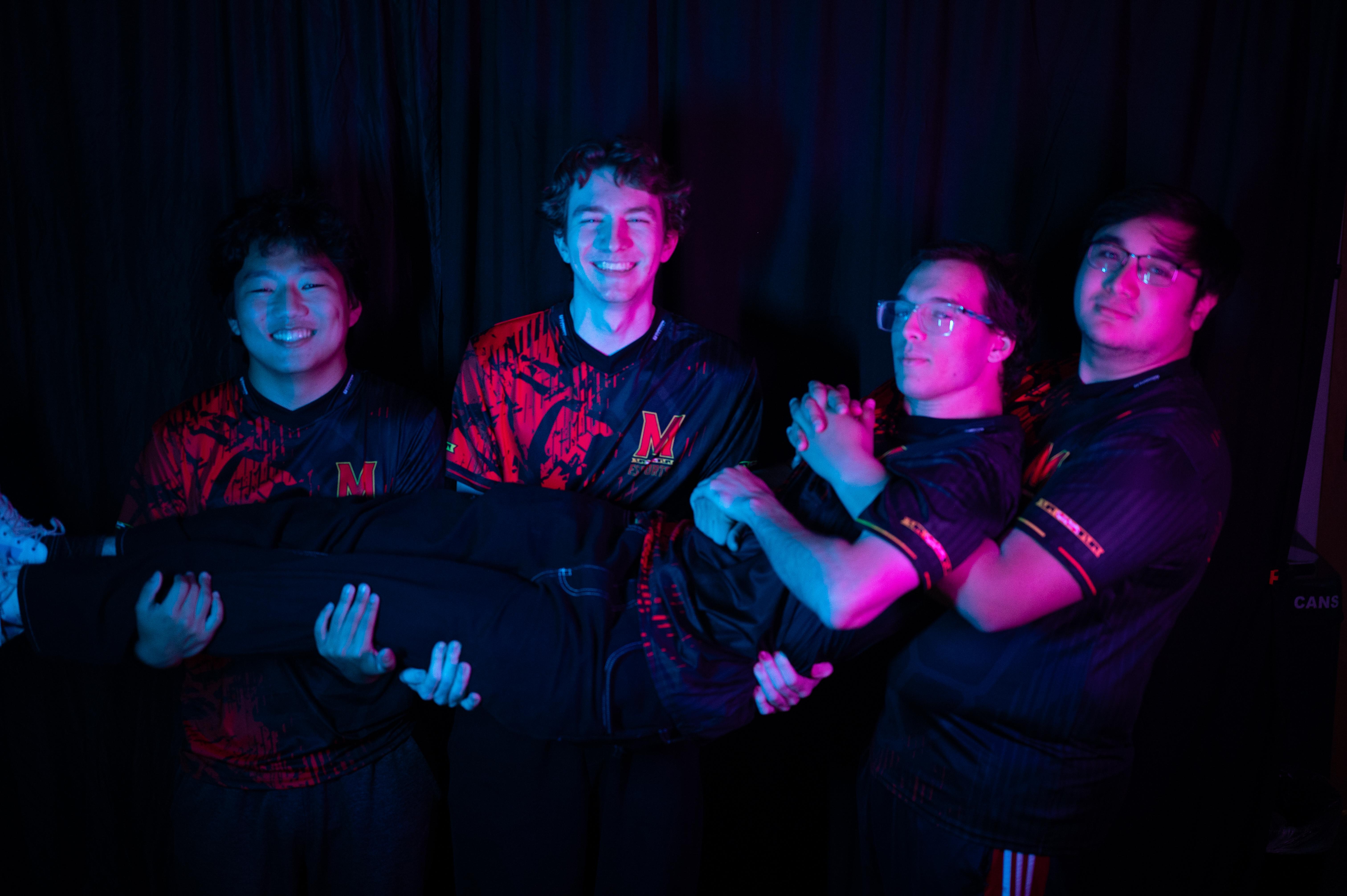 Overwatch team carrying their teammate.